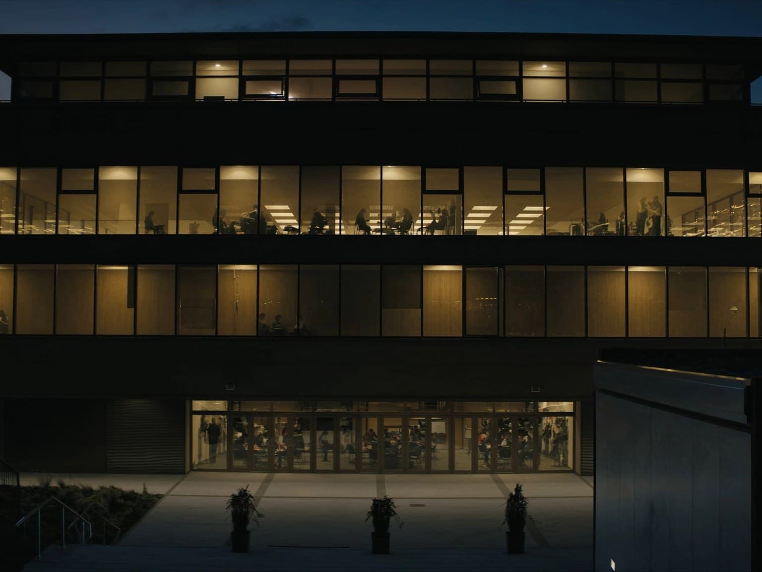 Lit community and training facility at night